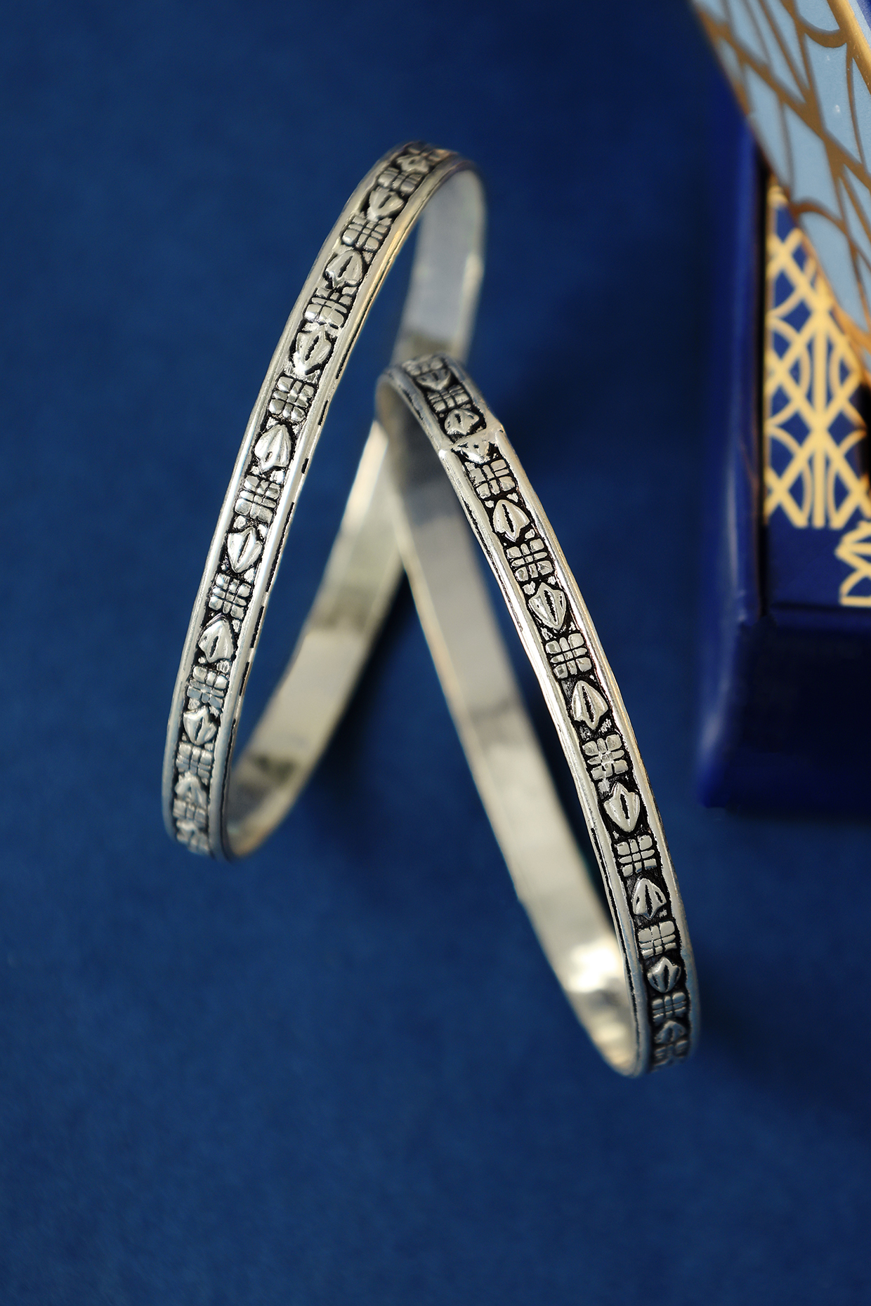 White Finish Temple Bangles In Sterling Silver (Set Of 2) by Mero at Pernia's Pop Up Shop