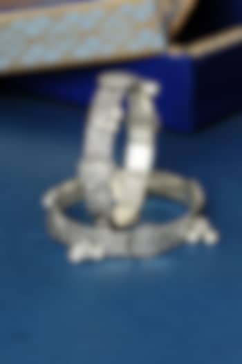 White Finish Temple Ghungroo Bangles In Sterling Silver (Set Of 2) by Mero at Pernia's Pop Up Shop