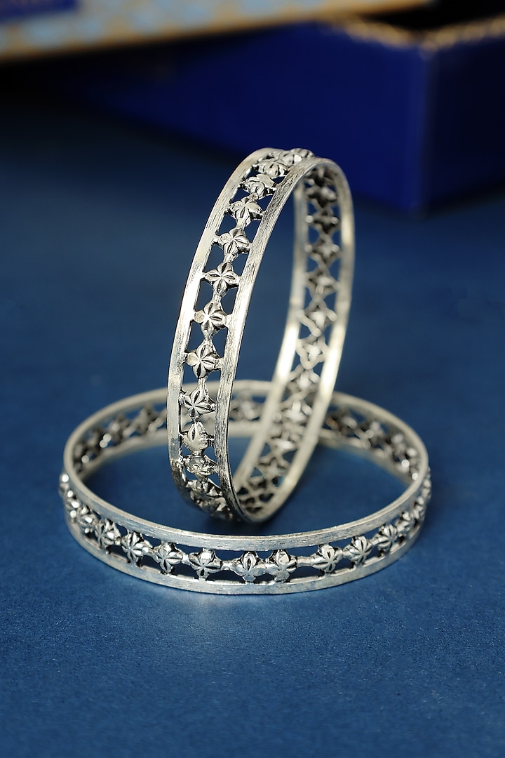 White Finish Temple Star Bangle In Sterling Silver (Set Of 2) by Mero at Pernia's Pop Up Shop