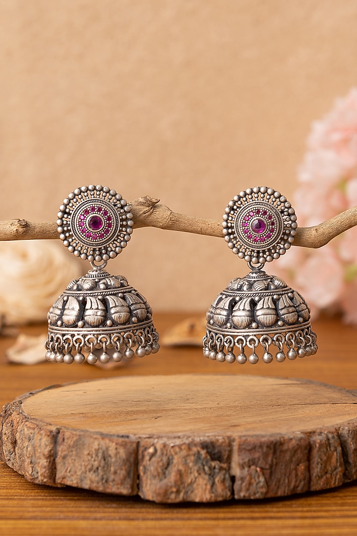 Silver Finish Pink Stone Temple Jhumka Earrings In Sterling Silver by Mero