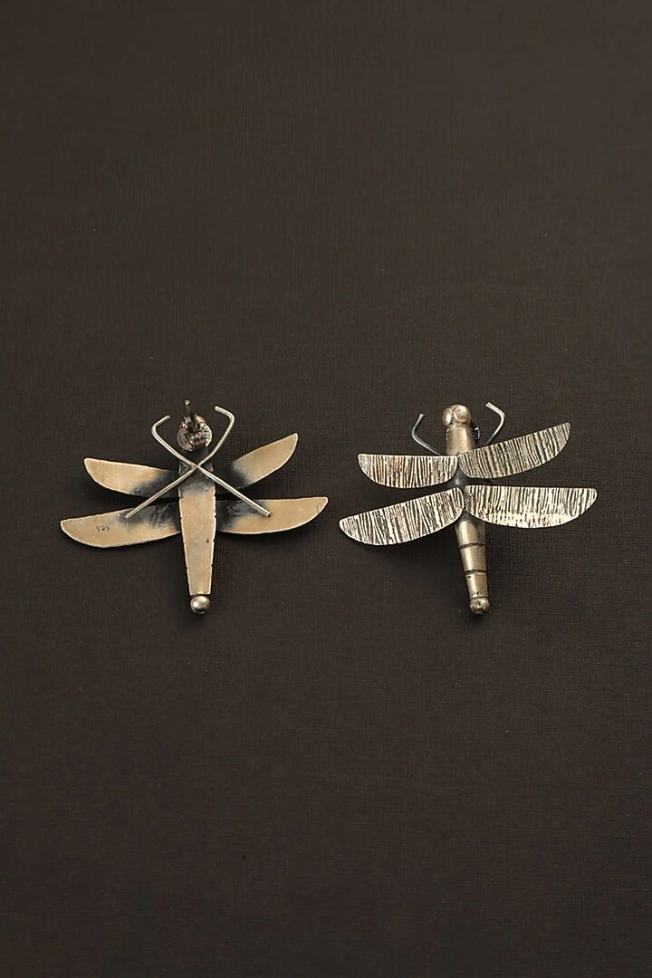 White Finish Fly Dangler Earrings In Sterling Silver by Mero at Pernia's Pop Up Shop