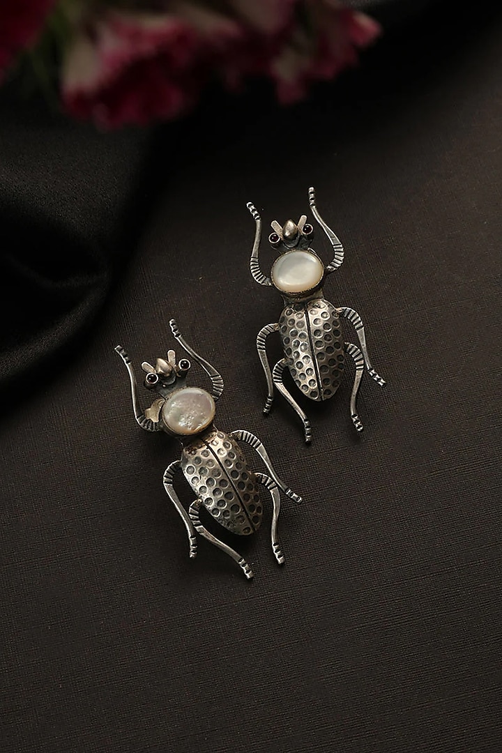 White Finish Mother Of Pearl Bug Dangler Earrings In Sterling Silver by Mero at Pernia's Pop Up Shop