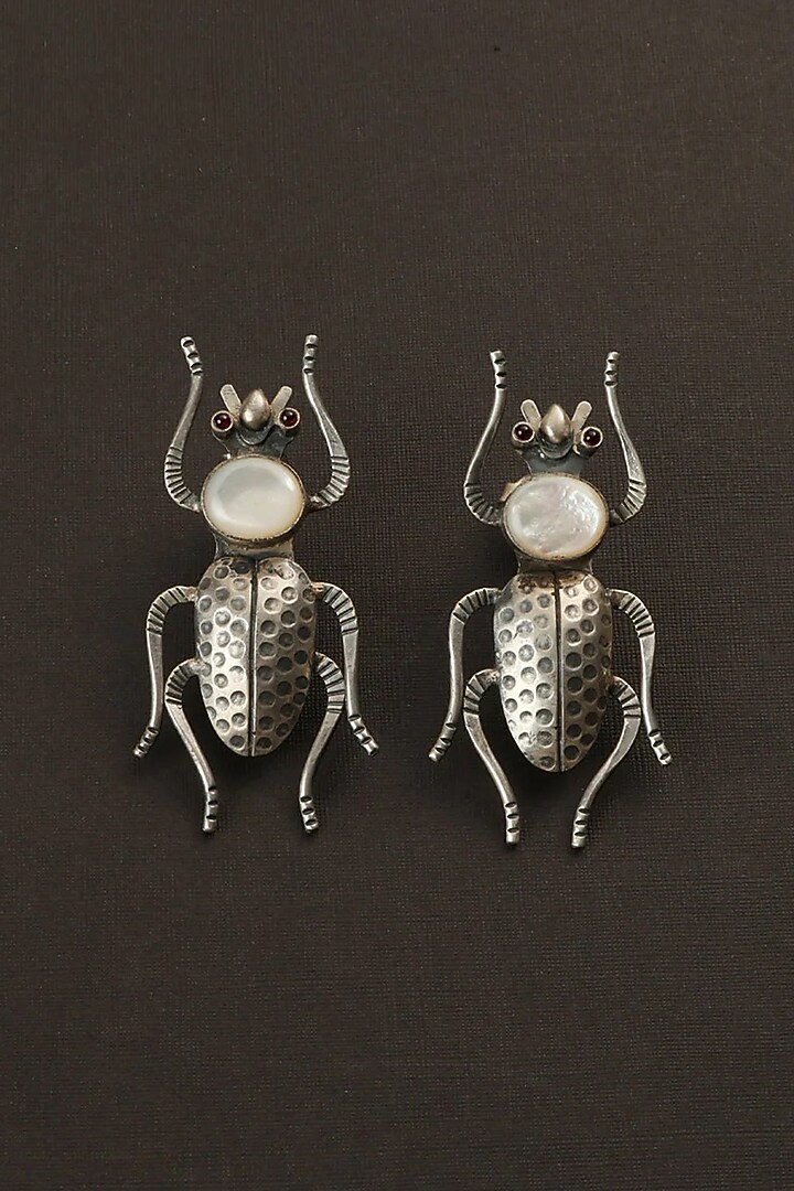 White Finish Mother Of Pearl Bug Dangler Earrings In Sterling Silver by Mero at Pernia's Pop Up Shop