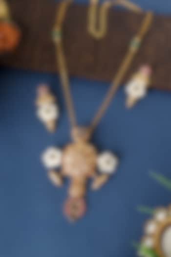 Gold Finish Kundan & Pearls Long Pendant Necklace Set In Sterling Silver by Mero at Pernia's Pop Up Shop