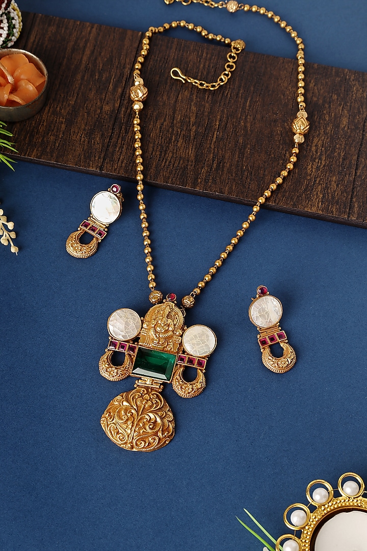 Gold Finish Kundan Temple Pendant Necklace Set In Sterling Silver by Mero at Pernia's Pop Up Shop