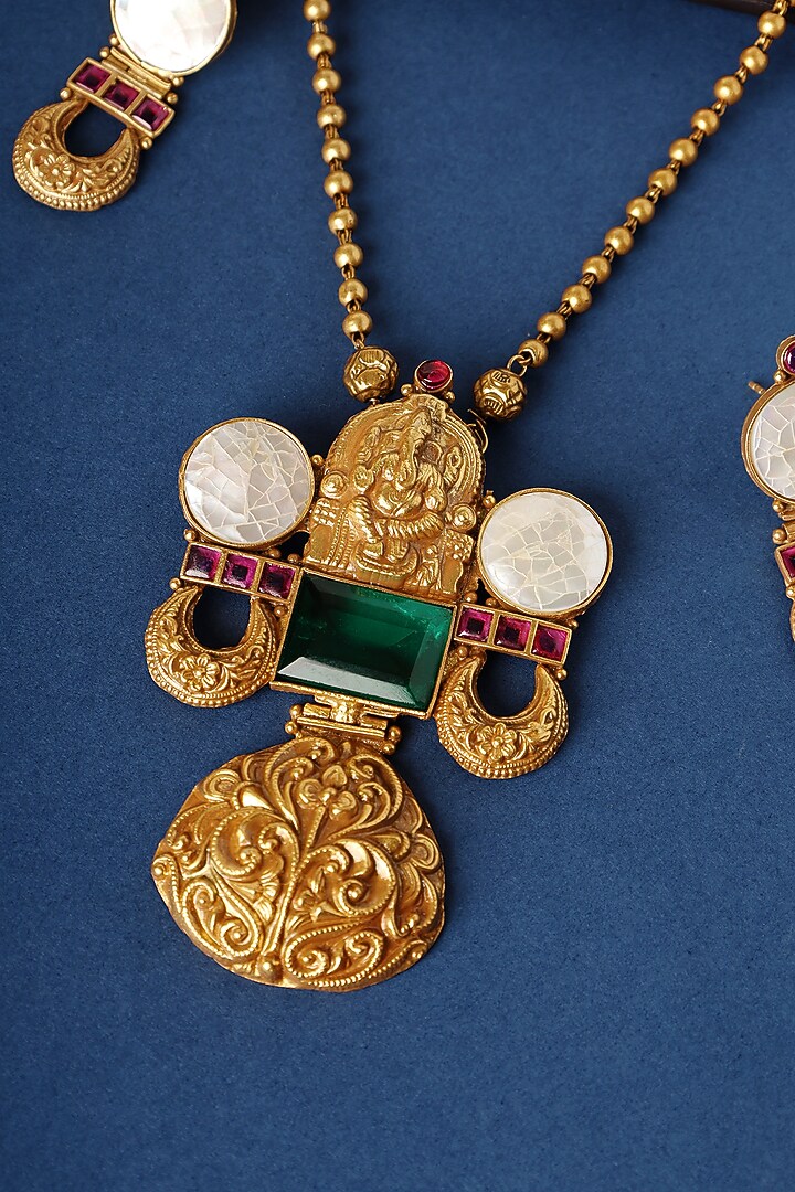 Gold Finish Kundan Temple Pendant Necklace Set In Sterling Silver by Mero at Pernia's Pop Up Shop