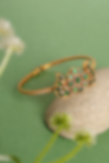 Gold Finish Emerald Kundan Polki Temple Kada In Sterling Silver by Mero at Pernia's Pop Up Shop