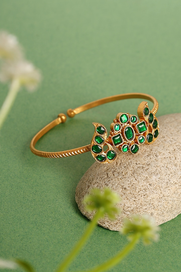 Gold Finish Emerald Kundan Polki Temple Kada In Sterling Silver by Mero at Pernia's Pop Up Shop