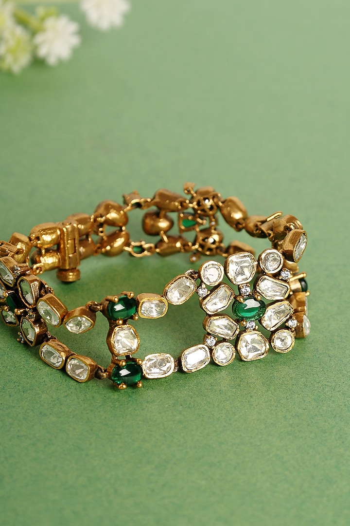 Gold Finish Green Moissanite Stone Bracelet In Sterling Silver by Mero at Pernia's Pop Up Shop
