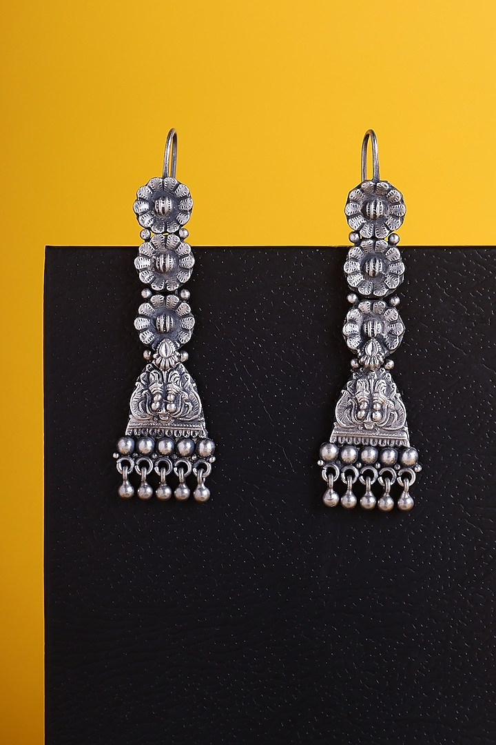 White Finish Kemp Stone Temple Floral Drop Earrings In Sterling Silver by Mero at Pernia's Pop Up Shop