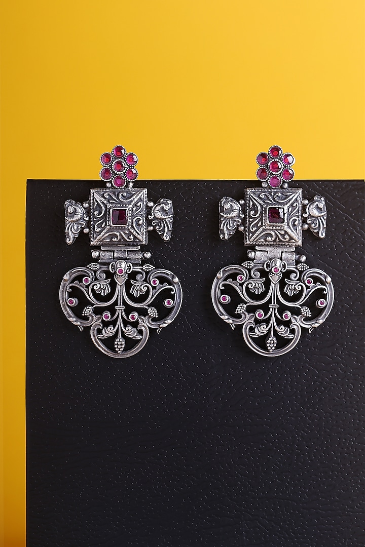 White Finish Carved Kemp Stone Temple Dangler Earrings In Sterling Silver by Mero at Pernia's Pop Up Shop