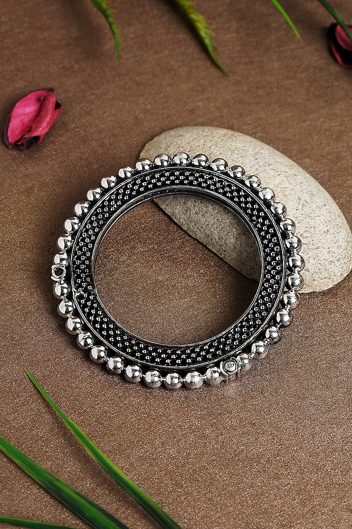 White Finish Textured Ball Temple Kada In Sterling Silver by Mero at Pernia's Pop Up Shop