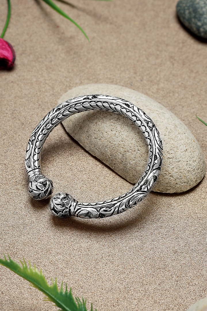 White Finish Thick Lion Temple Kada In Sterling Silver by Mero at Pernia's Pop Up Shop
