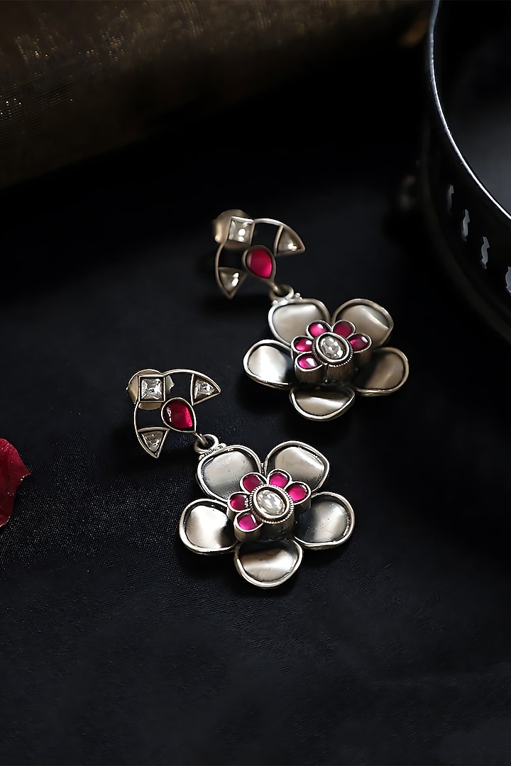 White Finish Pink Kundan Polki Temple Floral Earrings In Sterling Silver by Mero at Pernia's Pop Up Shop