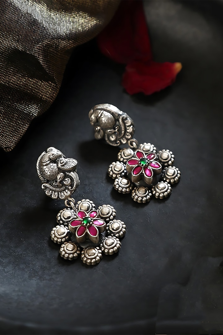 White Finish Pink Kundan Polki Peacock Floral Temple Earrings In Sterling Silver by Mero at Pernia's Pop Up Shop