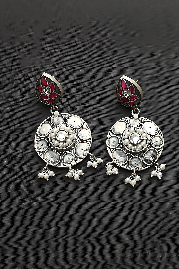 White Finish Pink Kundan Polki Temple Floral Earrings In Sterling Silver by Mero at Pernia's Pop Up Shop