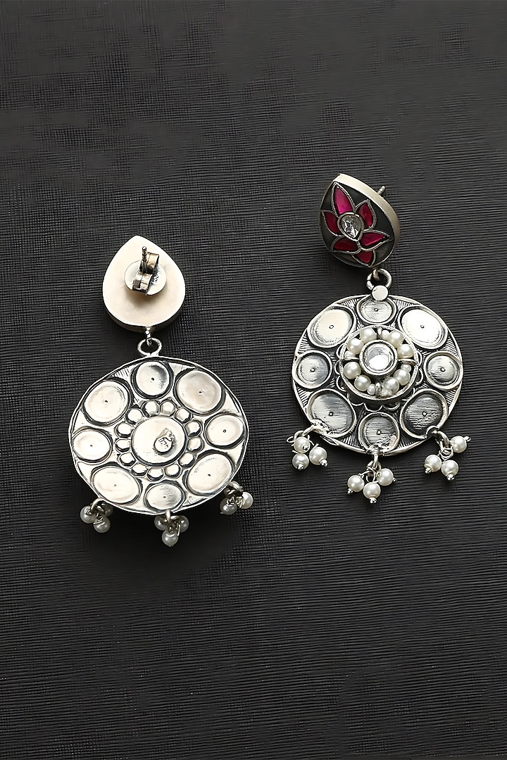 White Finish Pink Kundan Polki Temple Floral Earrings In Sterling Silver by Mero at Pernia's Pop Up Shop