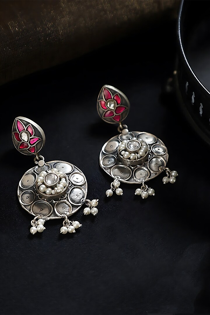 White Finish Pink Kundan Polki Temple Floral Earrings In Sterling Silver by Mero at Pernia's Pop Up Shop