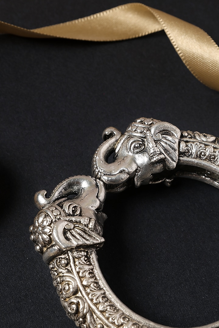 White Finish Vintage Temple Elephant Kada In Sterling Silver by Mero at Pernia's Pop Up Shop