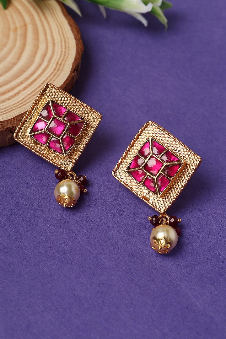 Gold Plated Pink Kundan Polki Temple Dangler Earrings In Sterling Silver by Mero at Pernia's Pop Up Shop