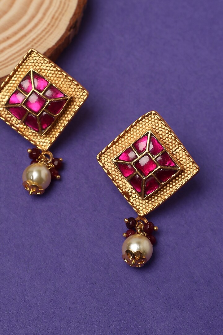 Gold Plated Pink Kundan Polki Temple Dangler Earrings In Sterling Silver by Mero at Pernia's Pop Up Shop