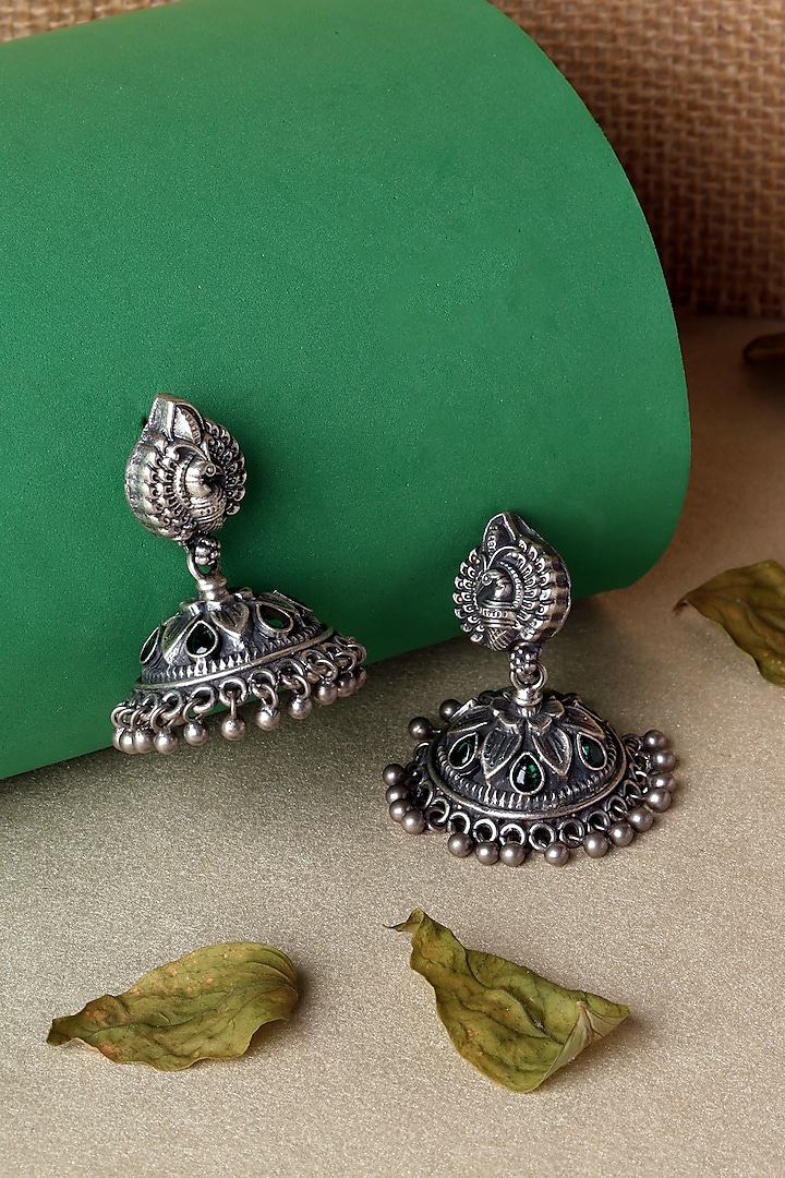 White Finish Kempstone Floral Temple Jhumka Earrings In Sterling Silver by Mero at Pernia's Pop Up Shop