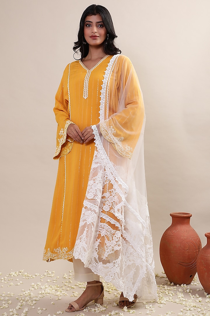 Mustard Georgette Embroidered Kurta Set by MERAKI BY POONAM SSANYAA at Pernia's Pop Up Shop