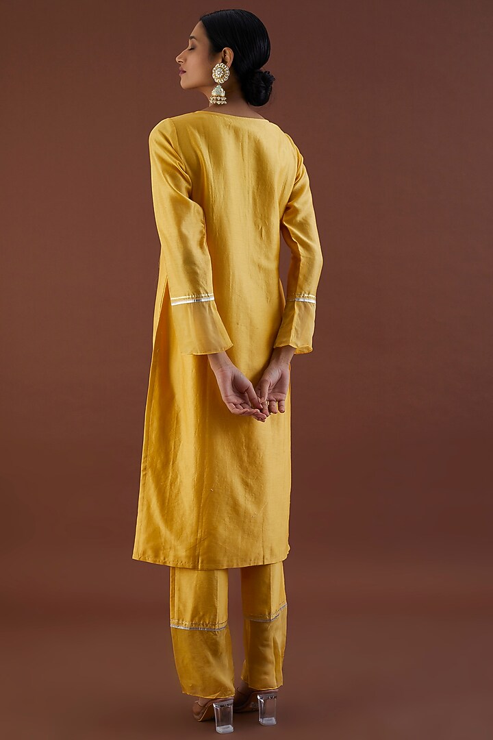 Pale Yellow Embroidered Kurta Set by Metamorphs at Pernia's Pop Up Shop