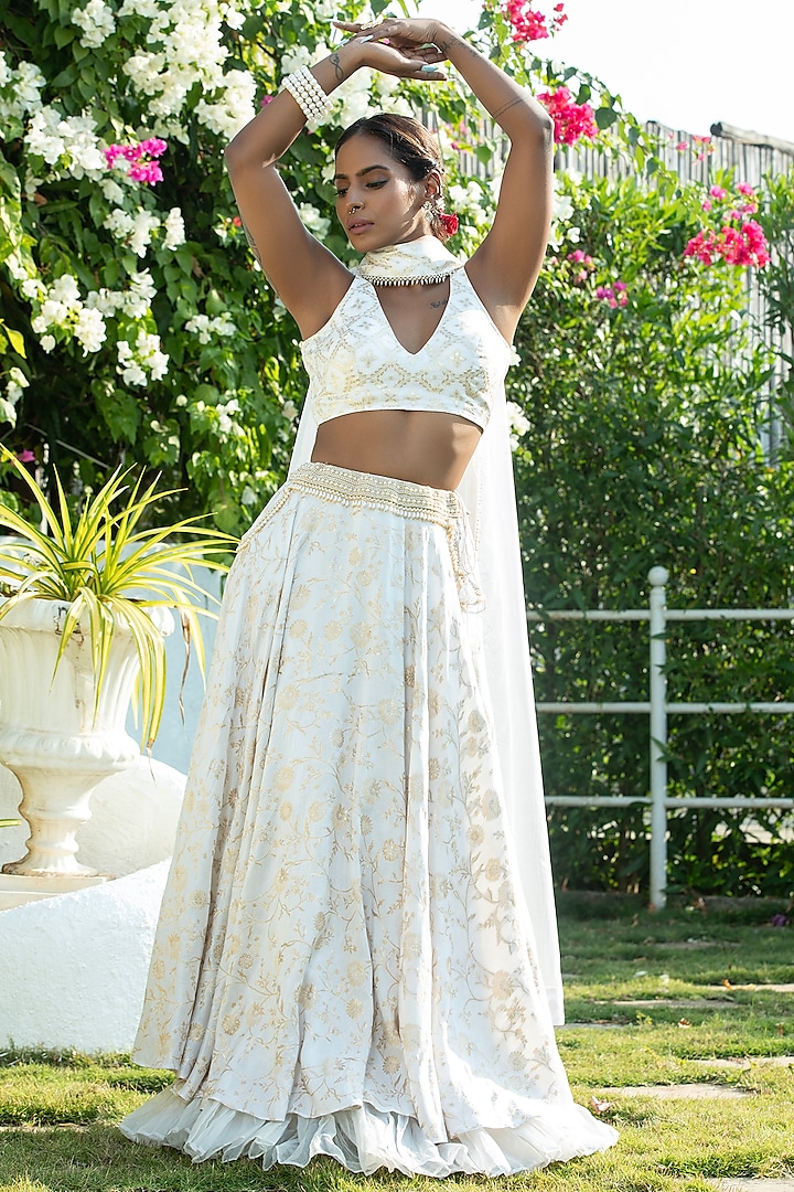 Ivory Brocade Pearl Lehenga Set For Girls by Mei & Zu at Pernia's Pop Up Shop