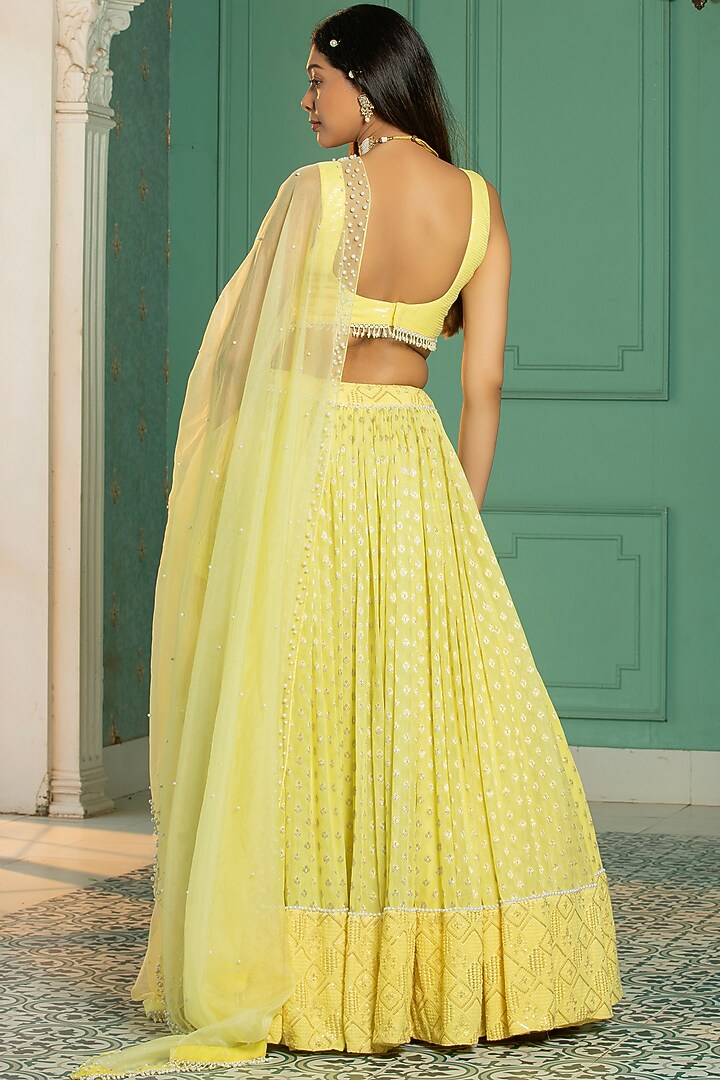 Yellow Georgette Embroidered Pleated Lehenga Set For Girls by Mei & Zu at Pernia's Pop Up Shop