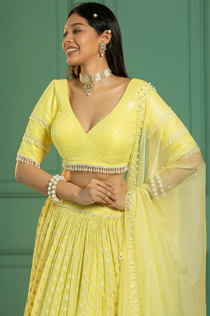 Yellow Georgette Embroidered Pleated Lehenga Set For Girls by Mei & Zu at Pernia's Pop Up Shop
