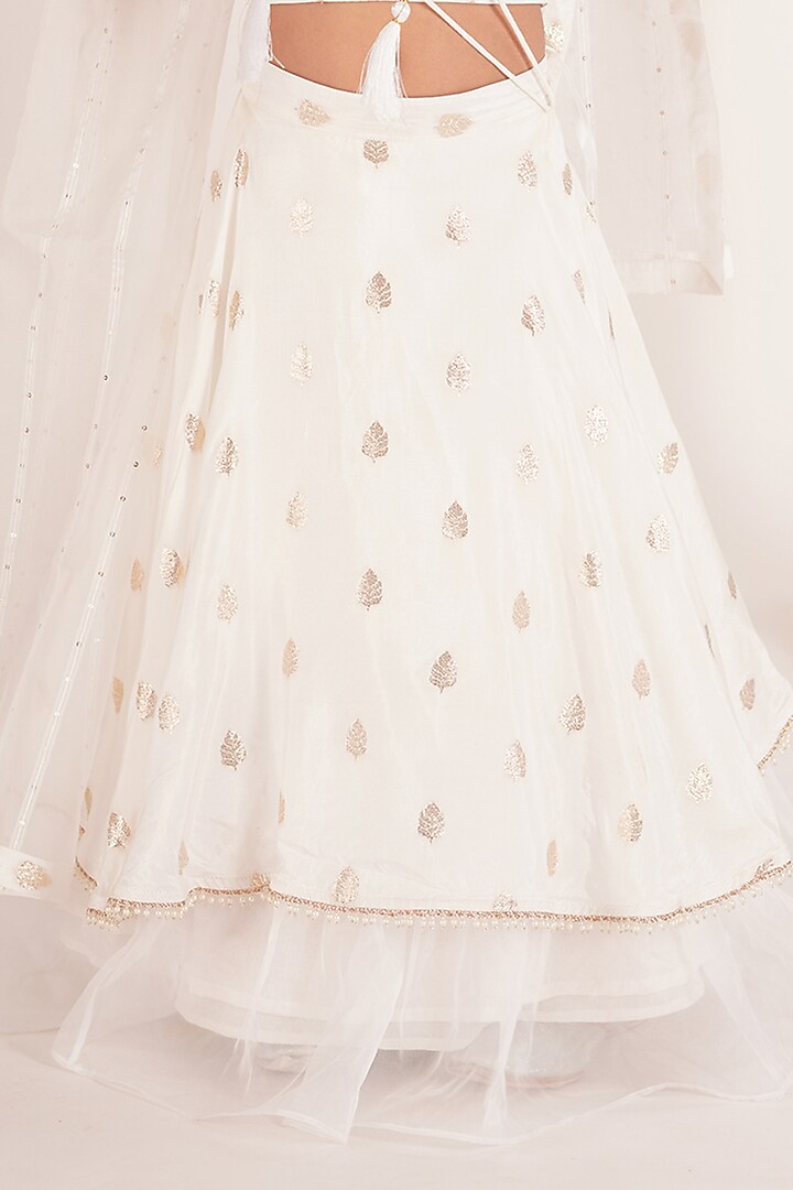 White Brocade Blend Tiered Lehenga Set For Girls by Mei & Zu at Pernia's Pop Up Shop