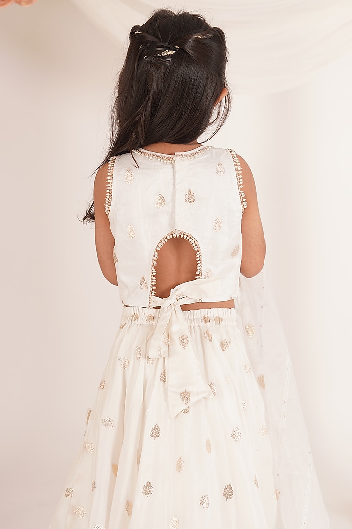 White Brocade Blend Tiered Lehenga Set For Girls by Mei & Zu at Pernia's Pop Up Shop