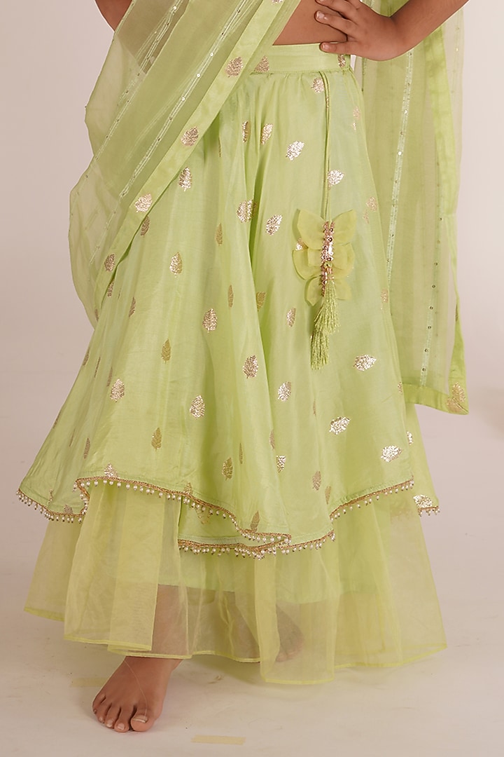 Pista Green Brocade Blend Tiered Lehenga Set For Girls by Mei & Zu at Pernia's Pop Up Shop