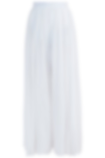 White flared pants by Meadow at Pernia's Pop Up Shop