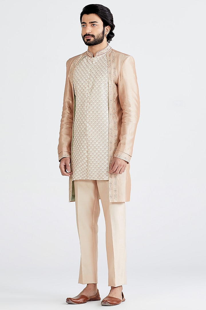 Nude Pink & Ecru Embellished Groom Sherwani Set by MEGHA BANSAL MEN at Pernia's Pop Up Shop