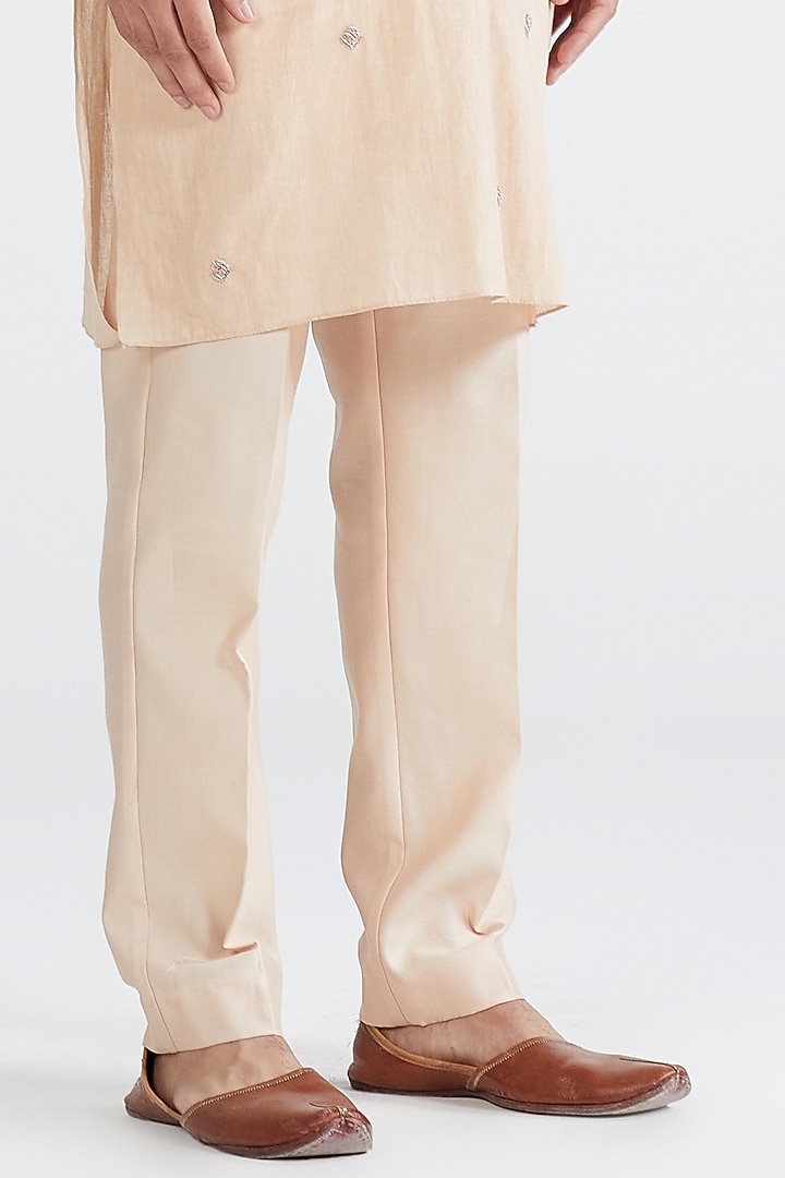 Pastel Peach Embroidered Kurta Set by MEGHA BANSAL MEN at Pernia's Pop Up Shop