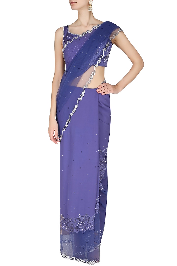Manav Gangwani presents Ink blue asymmetric french lace cut work saree with ink blue crystal embellished blouse available only at Pernia's Pop Up Shop.