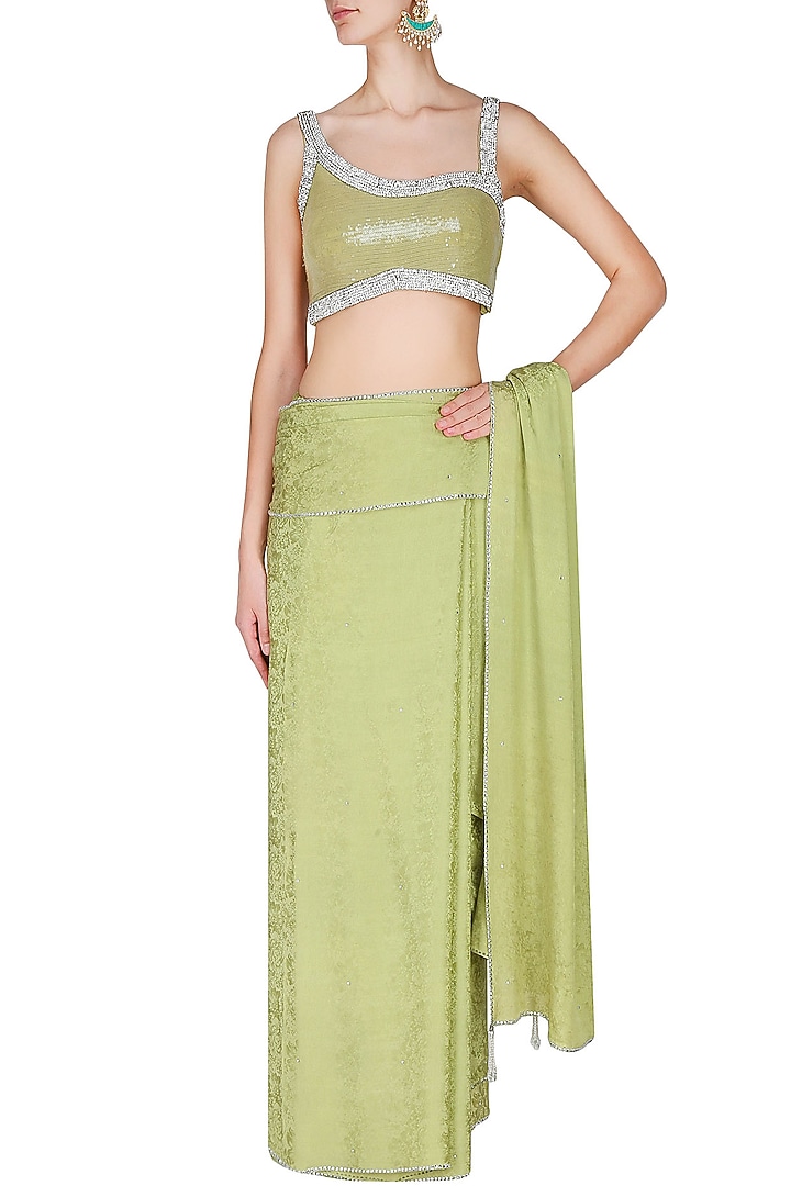 Manav Gangwani presents Olive green silver crystal line jacquard saree with matching olive green blouse available only at Pernia's Pop Up Shop.