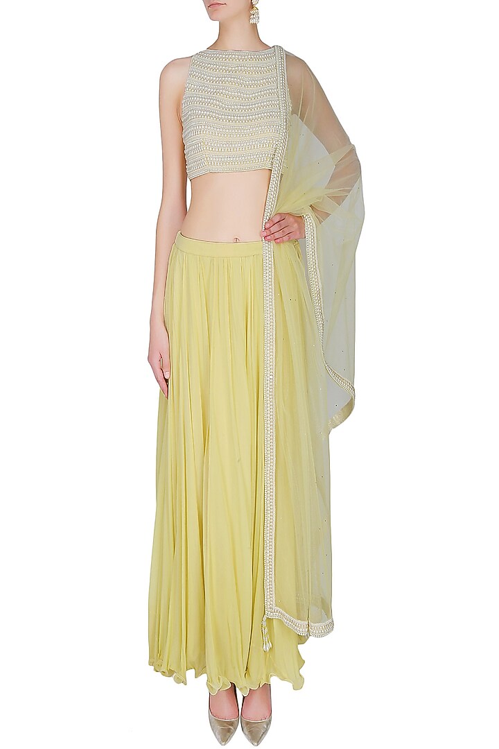 Manav Gangwani presents Lemon yellow pleated skirt with pearl embellished crop top blouse set available only at Pernia's Pop Up Shop.