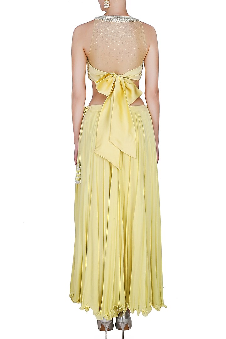 Manav Gangwani presents Lemon yellow pleated skirt with pearl embellished crop top blouse set available only at Pernia's Pop Up Shop.
