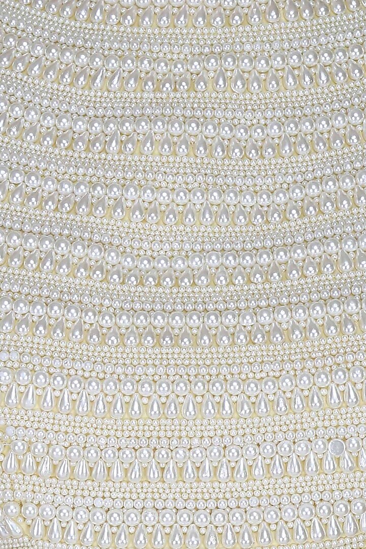 Manav Gangwani presents Lemon yellow pleated skirt with pearl embellished crop top blouse set available only at Pernia's Pop Up Shop.