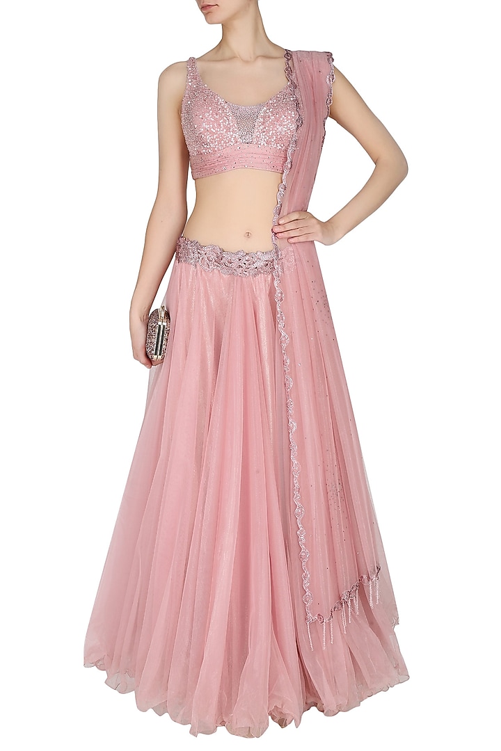 Manav Gangwani presents Onion pink flowy layered skirt with onion pink crystal embedded blouse set available only at Pernia's Pop Up Shop.