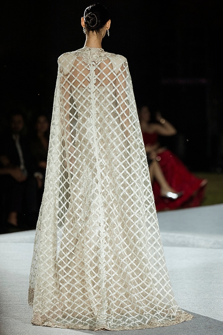 Champagne Tulle Bridal Gown With Cape by Mishru at Pernia's Pop Up Shop