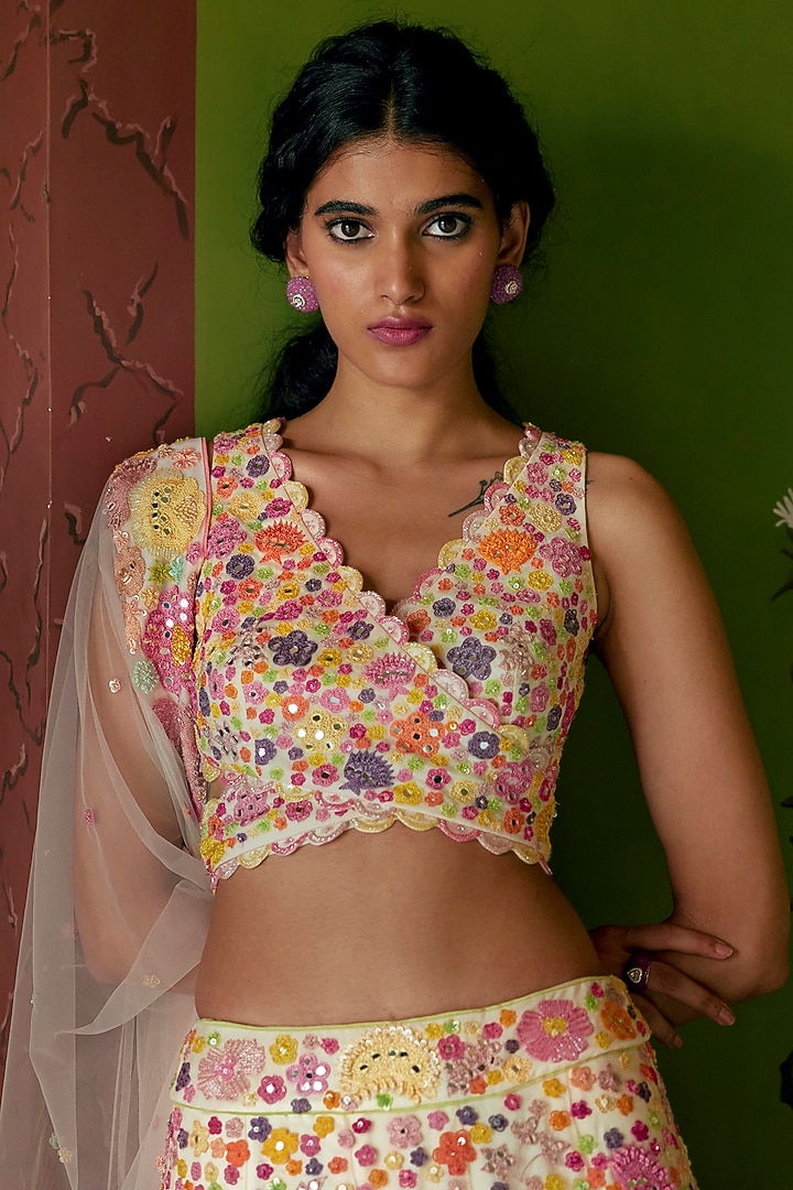 Ivory Bridal Lehenga Set With Multi-Colored Floral Embroidery by Mishru at Pernia's Pop Up Shop