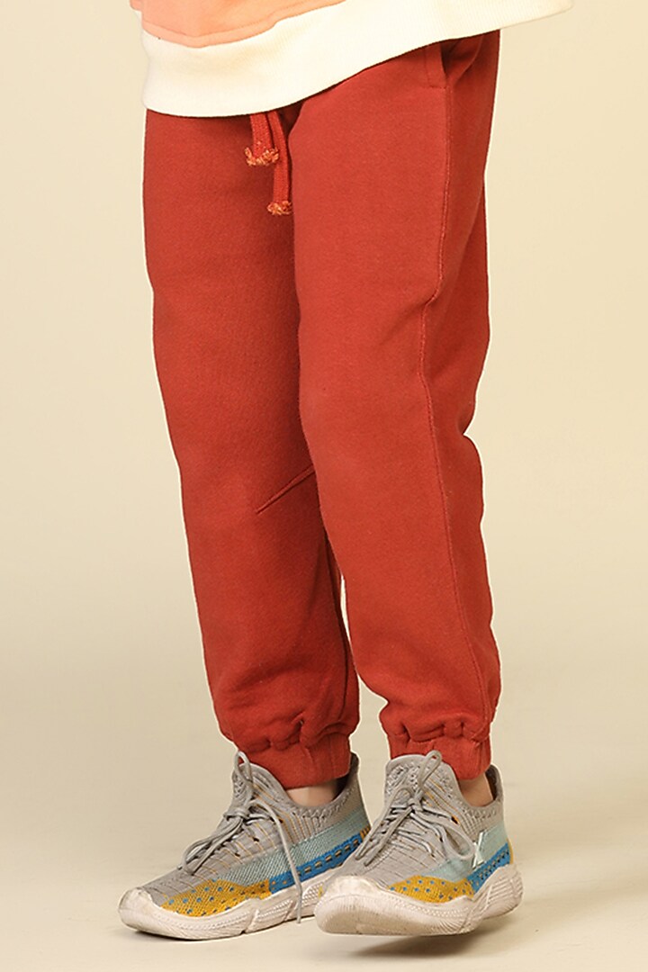 Brick Red Cotton Fleece Pants For Boys by Miko Lolo at Pernia's Pop Up Shop