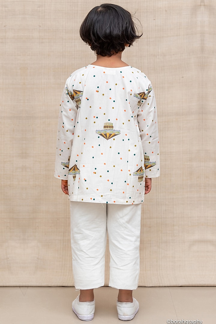 Off White Confetti & Carousels Printed Shirt For Girls by Miko Lolo at Pernia's Pop Up Shop