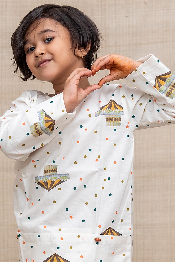 Off White Confetti & Carousels Printed Shirt For Girls by Miko Lolo at Pernia's Pop Up Shop