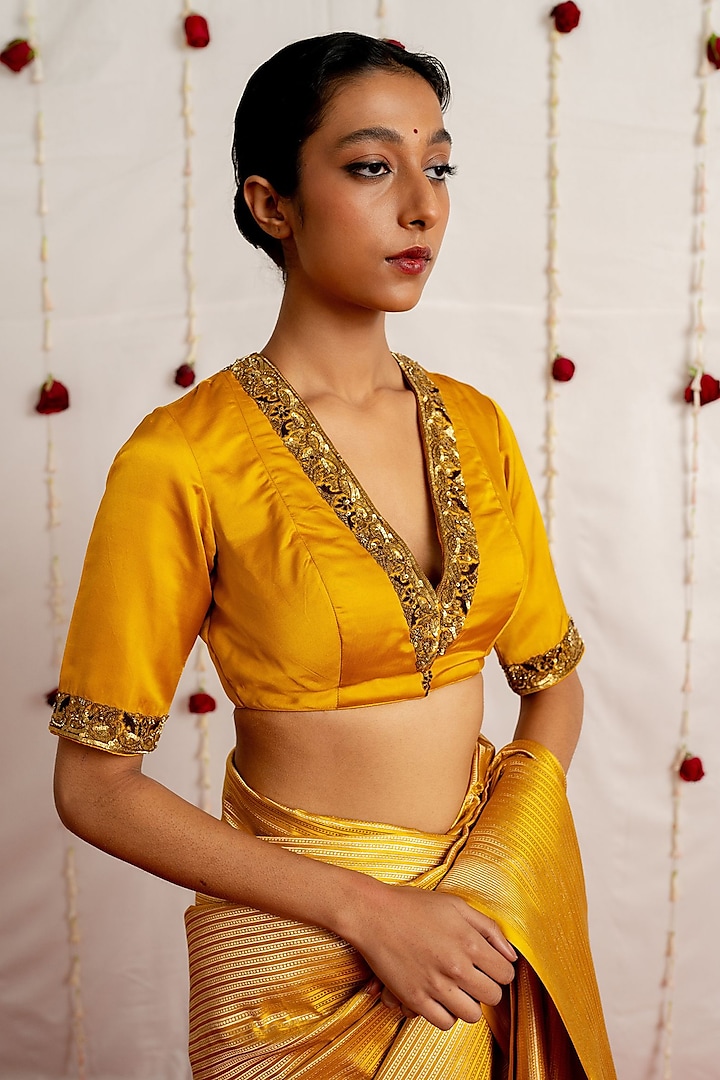 Mustard Satin Silk Embroidered Woven Blouse by Mimamsaa