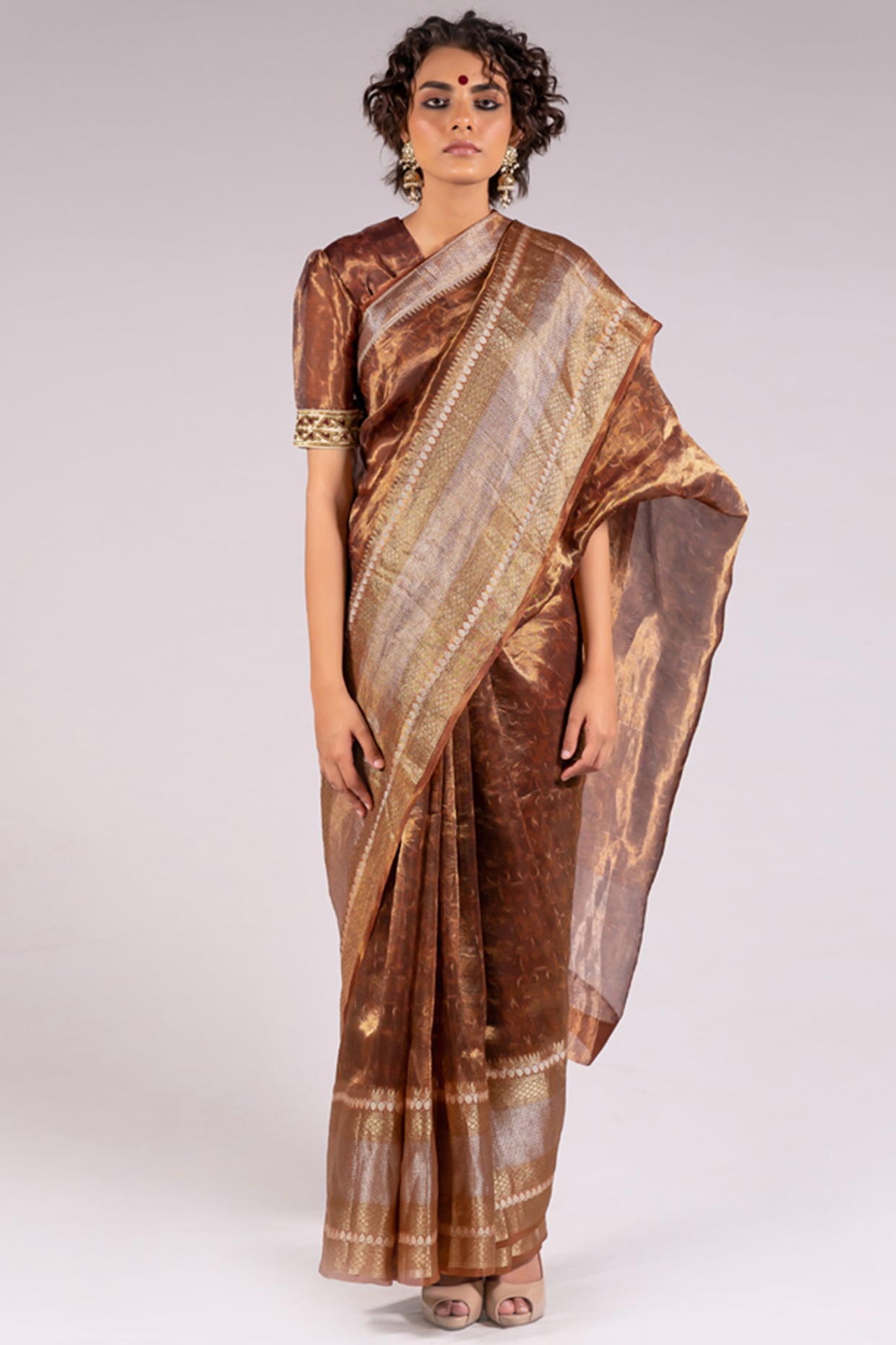 Gold meenakari jacquard silksaree,contrast border of thilakam mokku,neli  kodi poun,kathir,pallu of meenakari manga,jaal